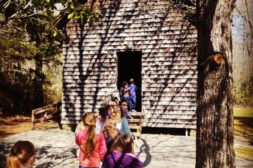 Kids going into the Cradle Schoolhouse