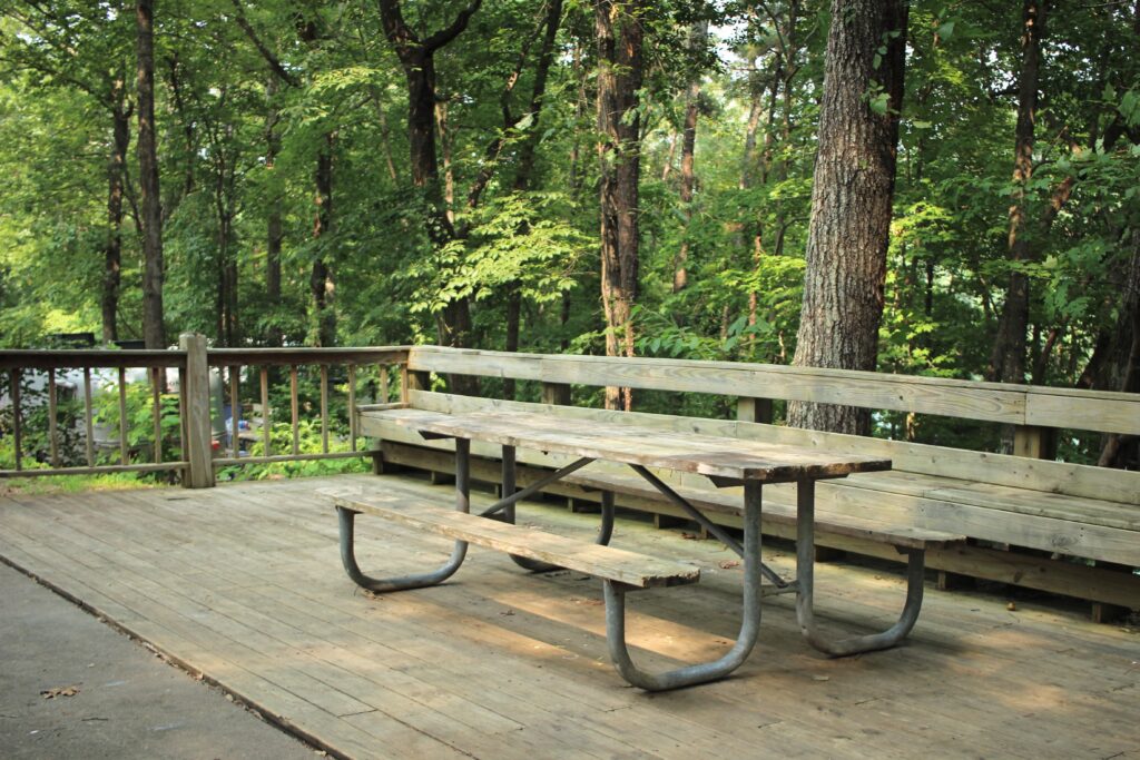 Doll Camp Picnic Table Stock Photo